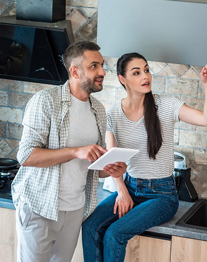 Couple using smar home device